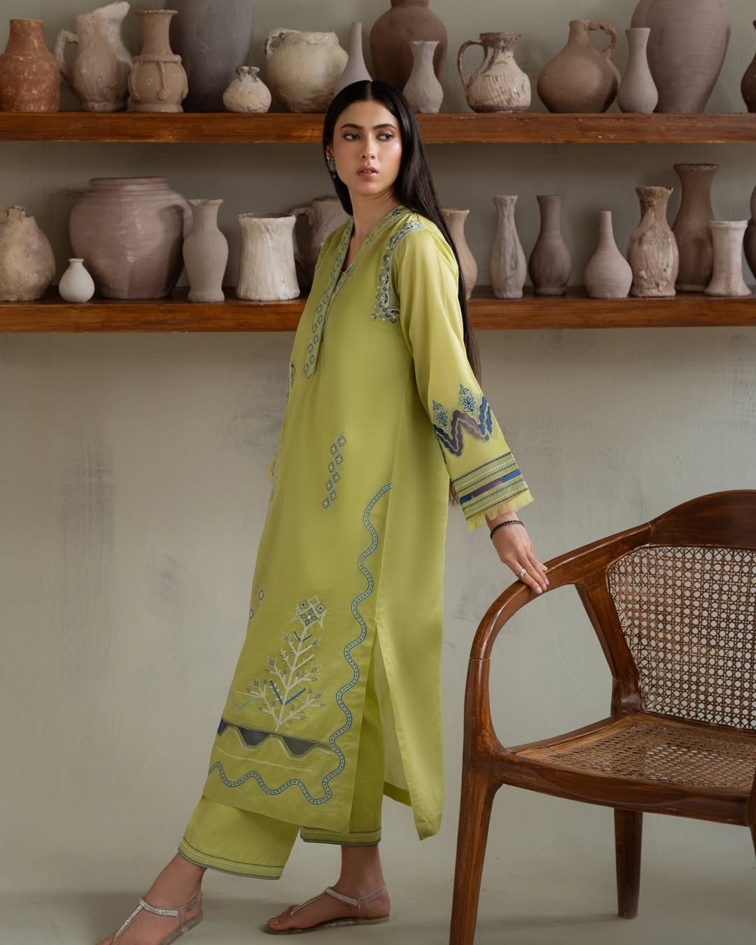 Crafted from paper silk, the apple Green Paisley set exudes summer charm. It features fine embro (4) PAKISTANI GREEN PAISELY DRESS - Image 1